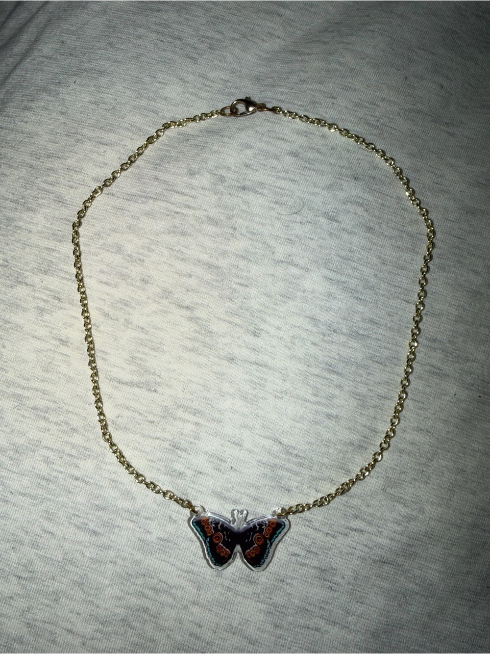 Gold Chain Necklace with Black and Orange Butterfly Pendant